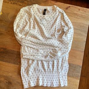 White sweater with black polka dots